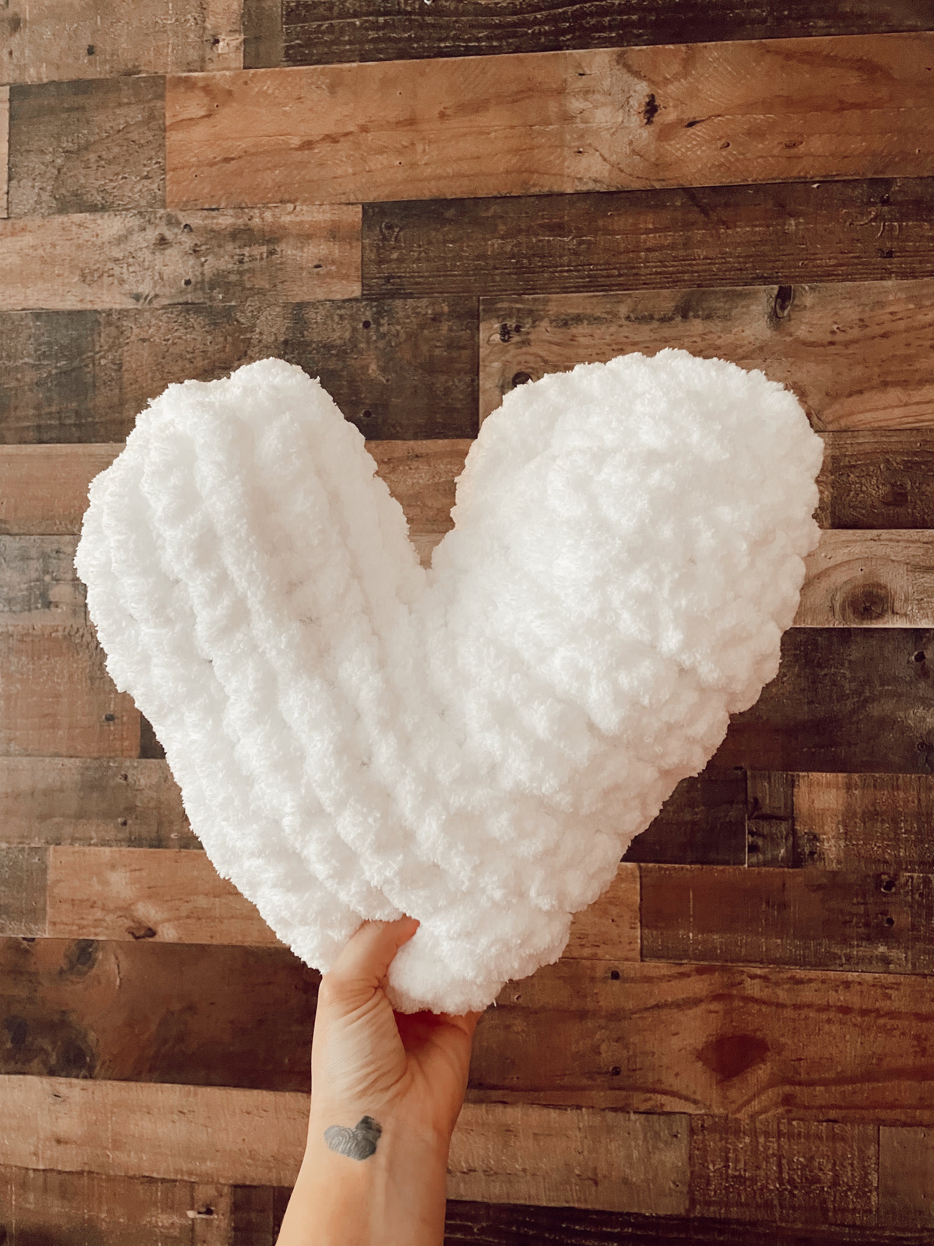 White heart shaped outlet pillow